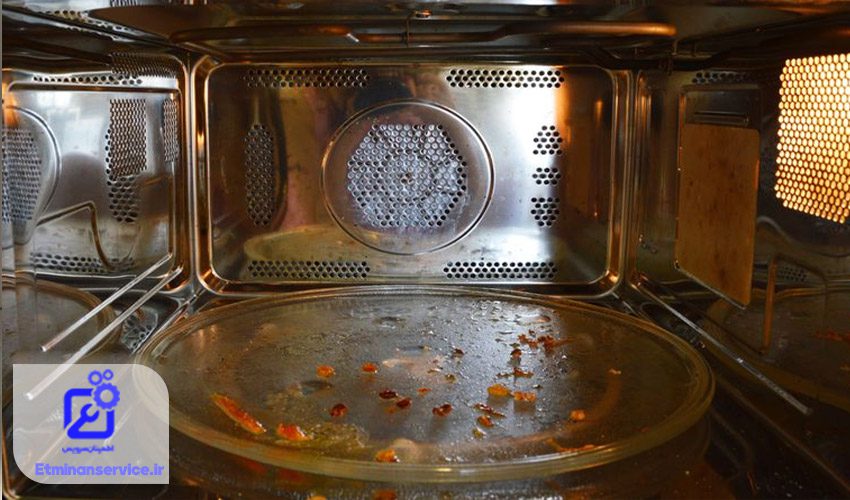 سر و صدا یا گیر کردن صفحه گردان مایکروویو به دلیل کثیفی