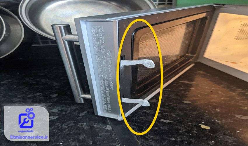 قفل درب مایکروفر خراب شده است