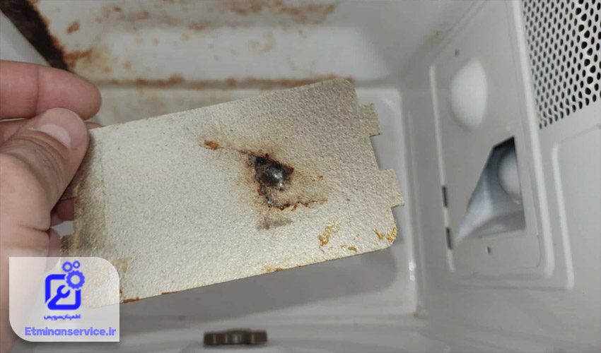 جرقه زدن مایکروویو گرنیه به دلیل آسیب دیدن پوشش میکا